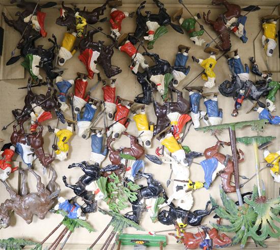 A collection of painted lead desert soldiers, palm trees etc